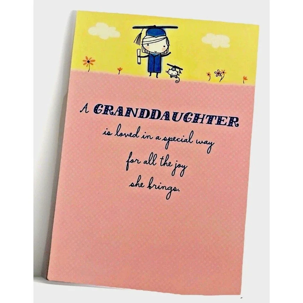 Granddaughter Grad Card “Loved In A Special Way For All The Joy She Brings”